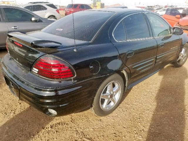 1G2NF52F12C121631 - 2002 PONTIAC GRAND AM S BLACK photo 4