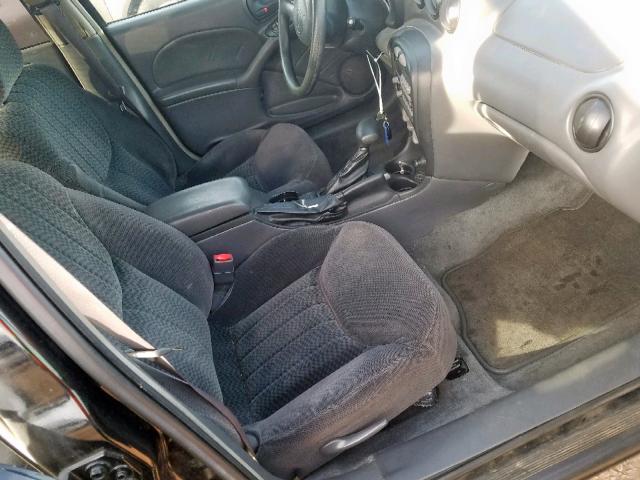 1G2NF52F12C121631 - 2002 PONTIAC GRAND AM S BLACK photo 5