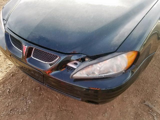 1G2NF52F12C121631 - 2002 PONTIAC GRAND AM S BLACK photo 9