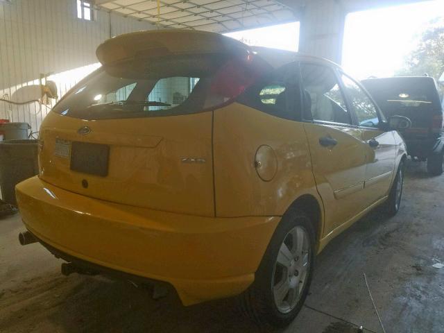 1FAFP37N86W237906 - 2006 FORD FOCUS ZX5 YELLOW photo 4