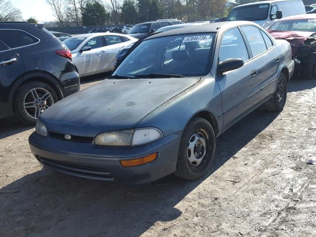 1Y1SK5368PZ027772 - 1993 GEO PRIZM BASE ლურჯი ფოტო 2