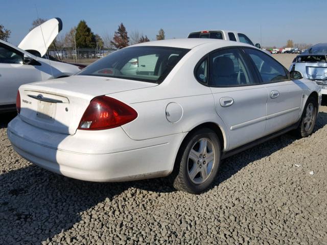 1FAFP56S8YG160485 - 2000 FORD TAURUS SEL WHITE photo 4