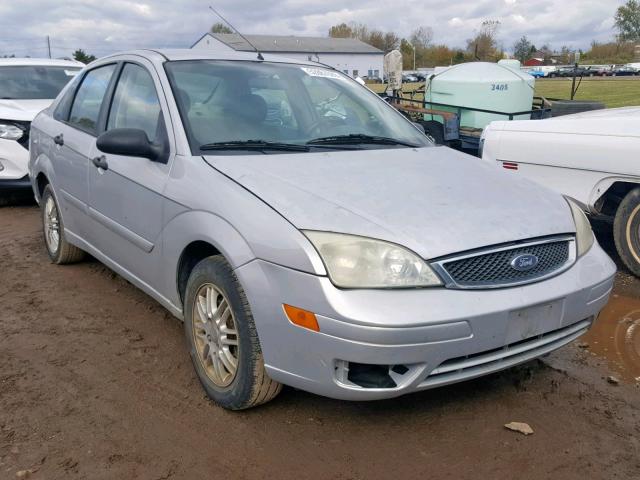 1FAFP34NX5W163455 - 2005 FORD FOCUS ZX4 SILVER photo 1