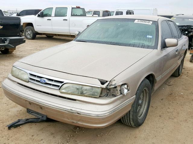 2FALP74W6VX146255 - 1997 FORD CROWN VICT GOLD photo 2