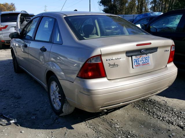 1FAFP34N46W148709 - 2006 FORD FOCUS ZX4 TAN photo 3