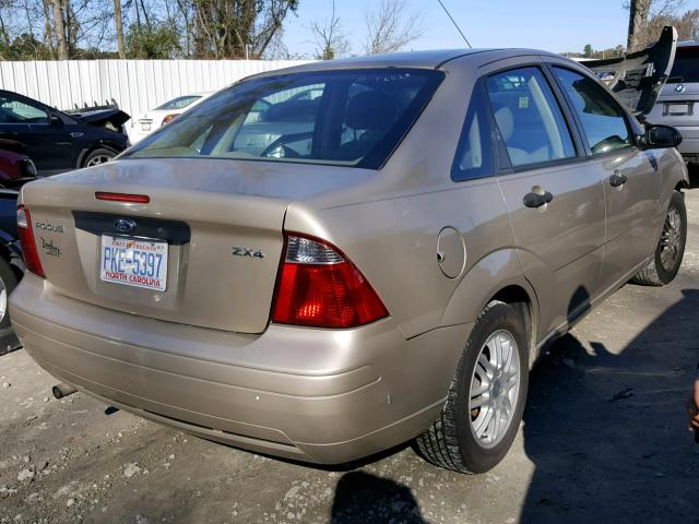 1FAFP34N46W148709 - 2006 FORD FOCUS ZX4 TAN photo 4