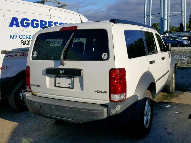 1D8GU28K77W577508 - 2007 DODGE NITRO SXT WHITE photo 4