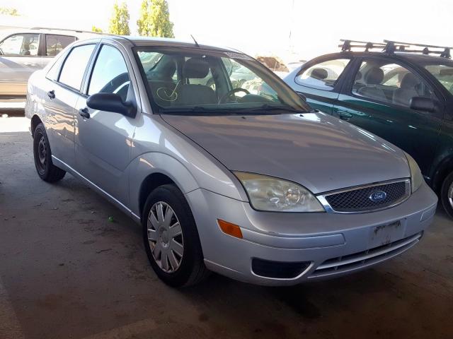 1FAFP34N85W145116 - 2005 FORD FOCUS ZX4 SILVER photo 1