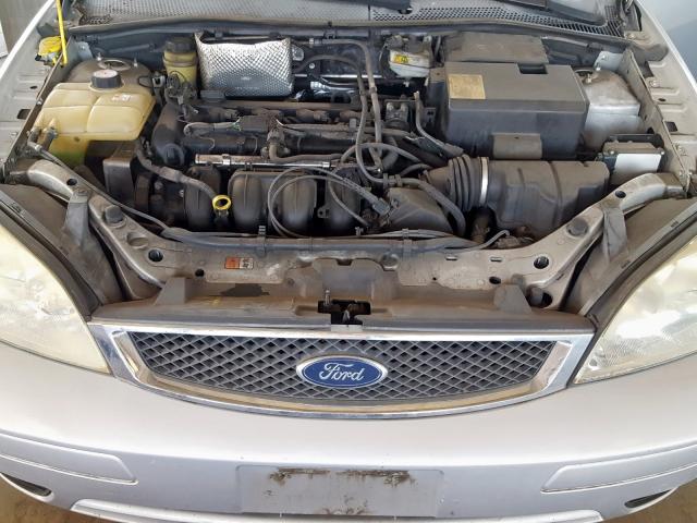 1FAFP34N85W145116 - 2005 FORD FOCUS ZX4 SILVER photo 7