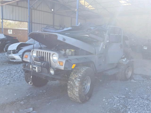 1J4FA49S12P717109 - 2002 JEEP WRANGLER / GRAY photo 2