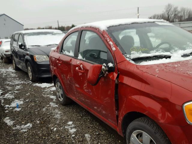 KL1TD5DE1BB233064 - 2011 CHEVROLET AVEO LS RED photo 9