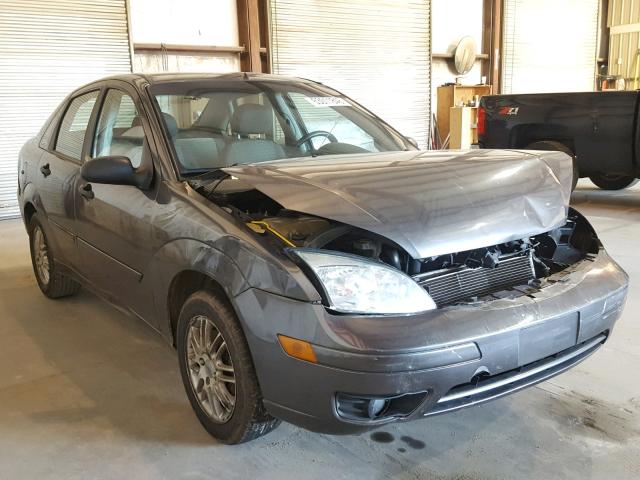 1FAFP34N07W247738 - 2007 FORD FOCUS ZX4 GRAY photo 1