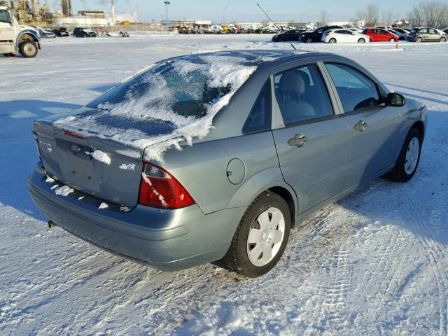 1FAFP34N96W246540 - 2006 FORD FOCUS ZX4 GRAY photo 4