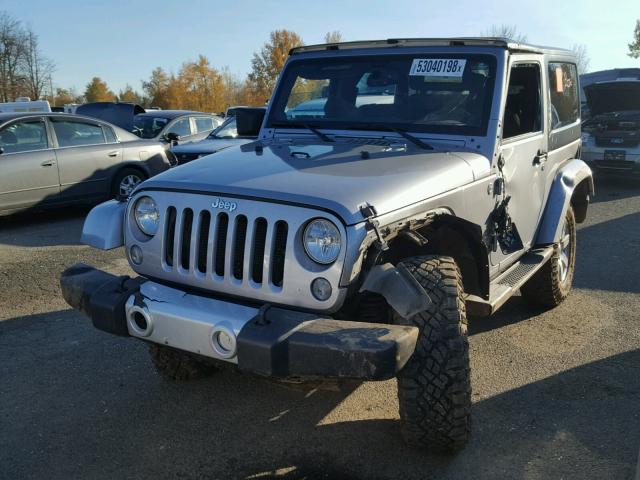 1C4AJWBG2EL125909 - 2014 JEEP WRANGLER S SILVER photo 2