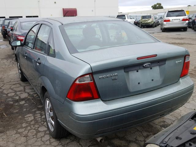 1FAFP34N55W176467 - 2005 FORD FOCUS ZX4 GREEN photo 3