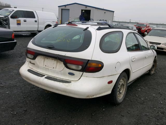 1FALP57U3TG138311 - 1996 FORD TAURUS GL WHITE photo 4