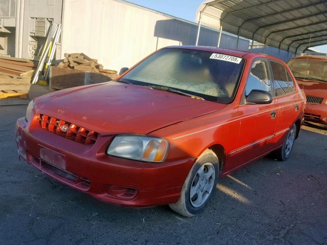 KMHCG45GXYU119292 - 2000 HYUNDAI ACCENT GL RED photo 2