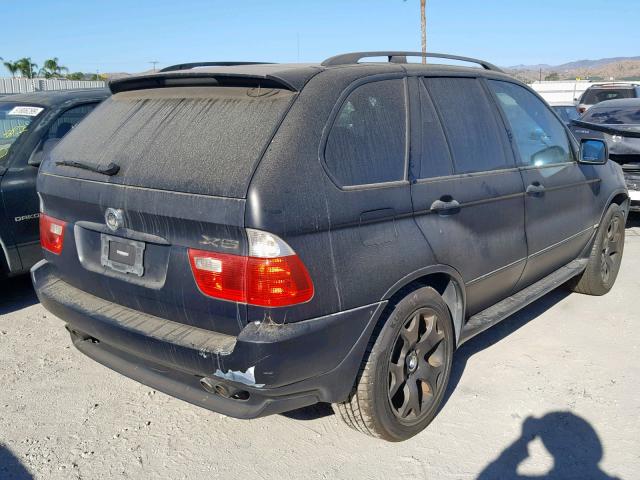 WBAFB33561LH11005 - 2001 BMW X5 4.4I BLACK photo 4