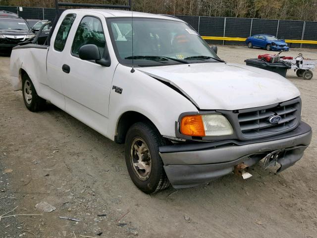 2FTRX17284CA82669 - 2004 FORD F-150 HERI WHITE photo 1