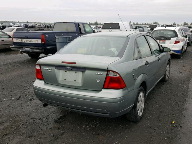 1FAFP34N76W183115 - 2006 FORD FOCUS ZX4 GREEN photo 4