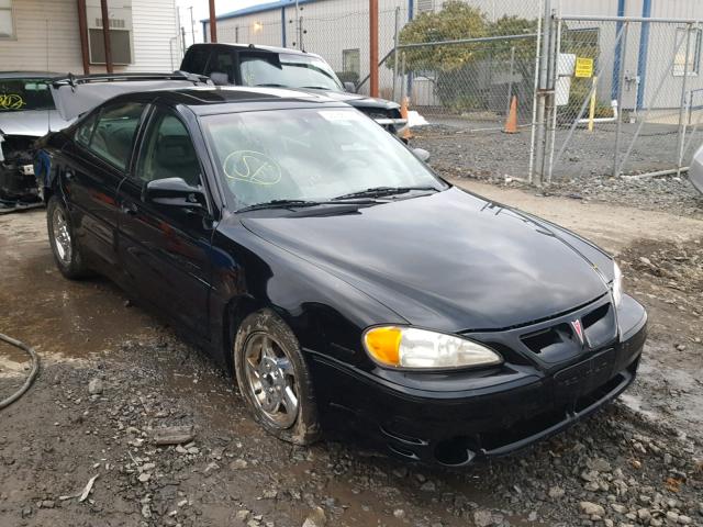 1G2NV52E72M594017 - 2002 PONTIAC GRAND AM G BLACK photo 1