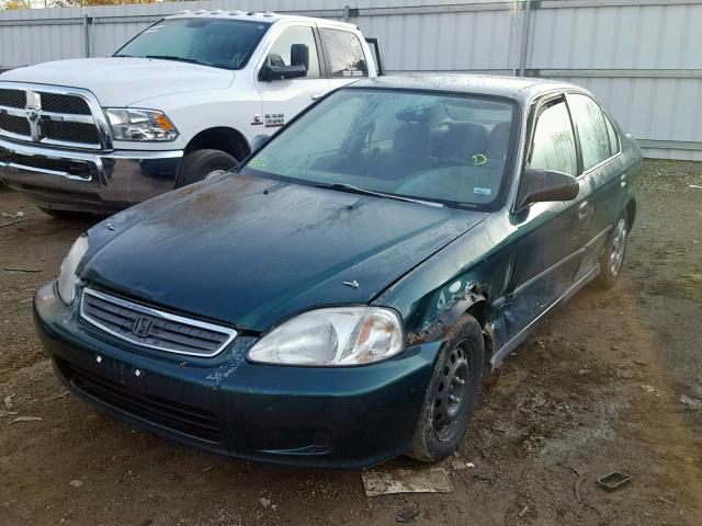 1HGEJ6673XL044398 - 1999 HONDA CIVIC LX GREEN photo 2