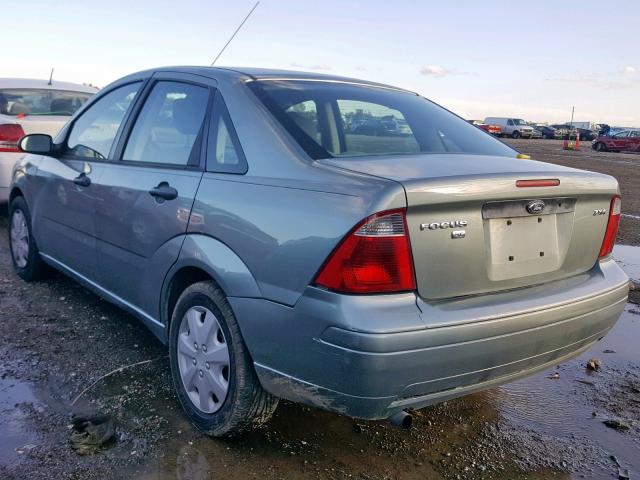 1FAFP34N95W207073 - 2005 FORD FOCUS ZX4 GREEN photo 3