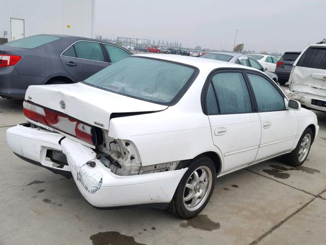 1NXBB02E1VZ557930 - 1997 TOYOTA COROLLA DX WHITE photo 4