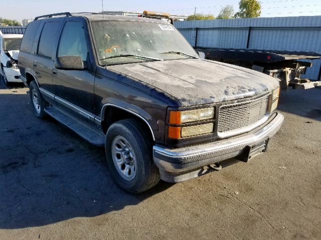 1GKEK13R1VJ726682 - 1997 GMC YUKON BLACK photo 1