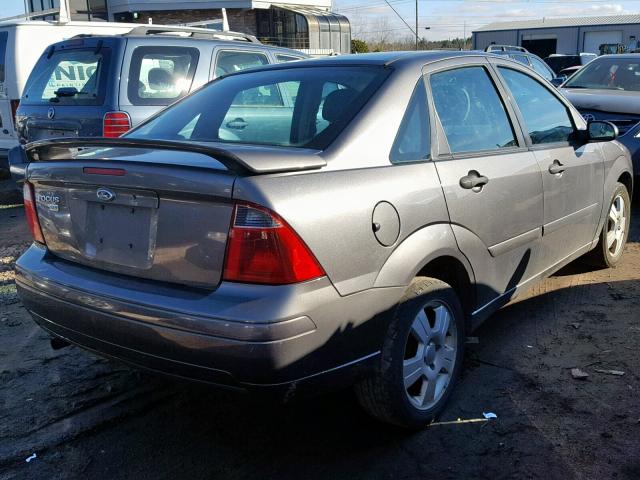 1FAHP34N37W162658 - 2007 FORD FOCUS ZX4 GRAY photo 4