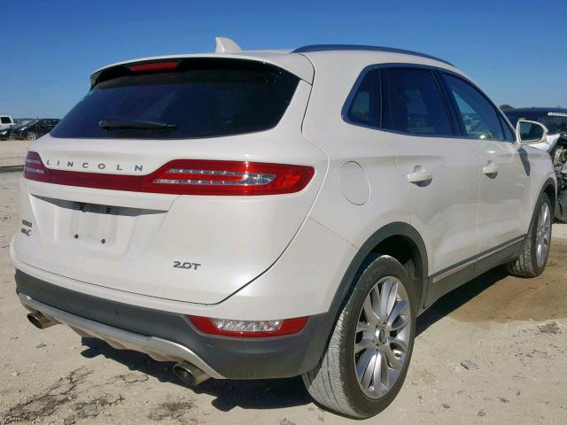 5LMCJ3C98HUL44601 - 2017 LINCOLN MKC RESERV BEIGE photo 4