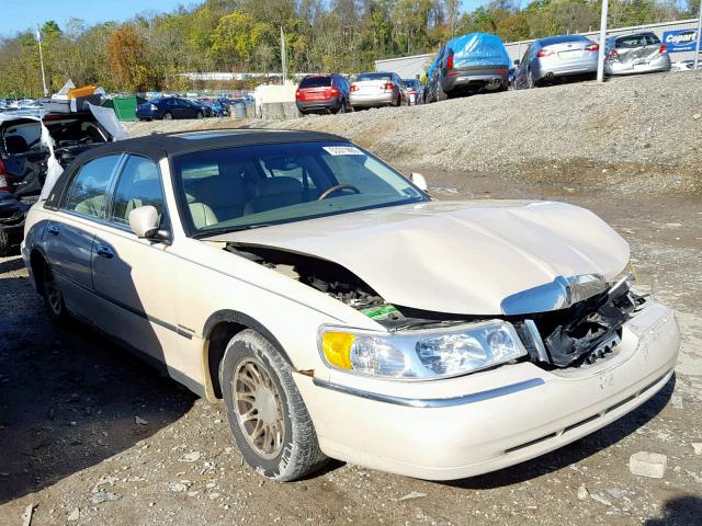 1LNHM83W6YY765115 - 2000 LINCOLN TOWN CAR C TAN photo 1