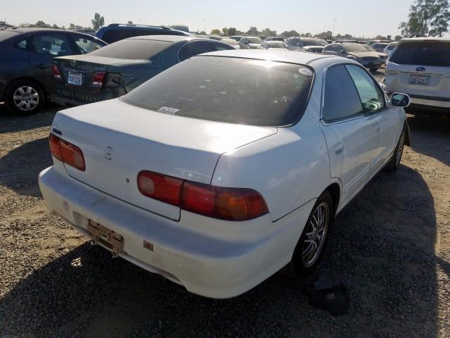 JH4DB7656YS003572 - 2000 ACURA INTEGRA LS WHITE photo 4