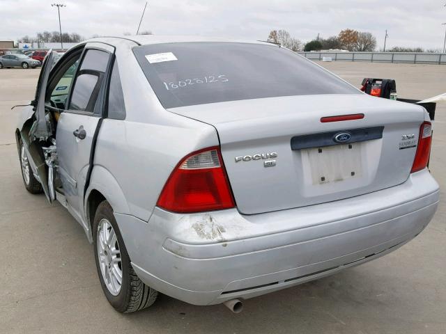 1FAFP34N05W150309 - 2005 FORD FOCUS ZX4 GRAY photo 3