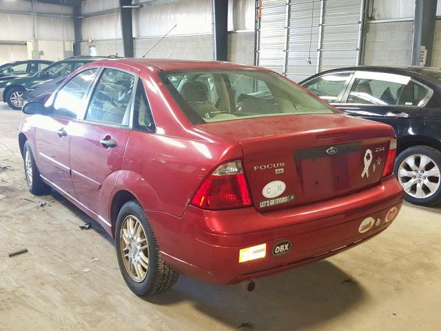 1FAFP34N55W239583 - 2005 FORD FOCUS ZX4 RED photo 3