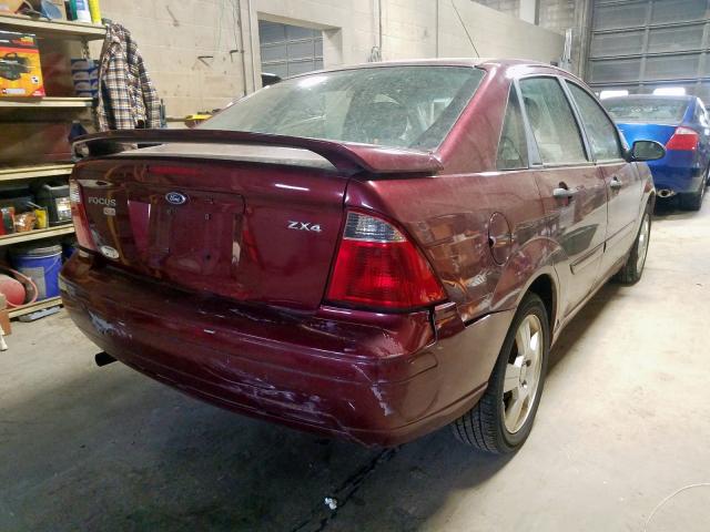 1FAFP34N96W126589 - 2006 FORD FOCUS ZX4 RED photo 4