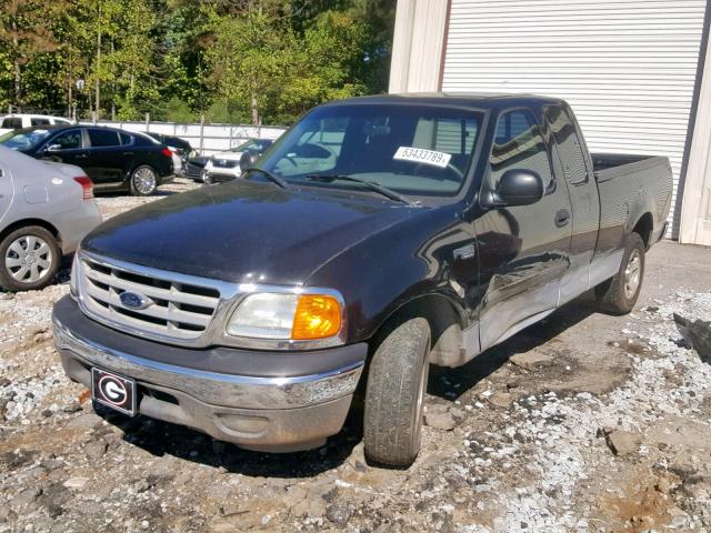 2FTRX17224CA83607 - 2004 FORD F-150 HERI BLACK photo 2