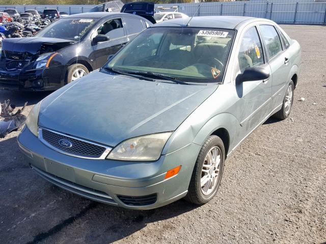 1FAFP34N05W289243 - 2005 FORD FOCUS ZX4 GREEN photo 2