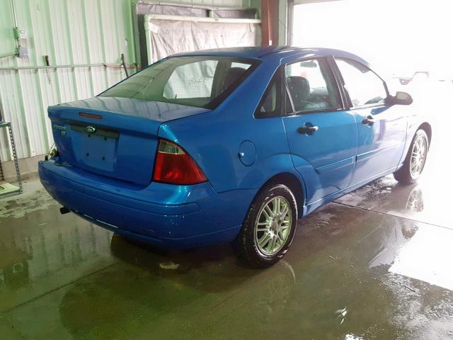 1FAFP34N97W255031 - 2007 FORD FOCUS ZX4 BLUE photo 4