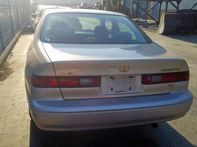 JT2BF22K3V0022334 - 1997 TOYOTA CAMRY LE GOLD photo 9