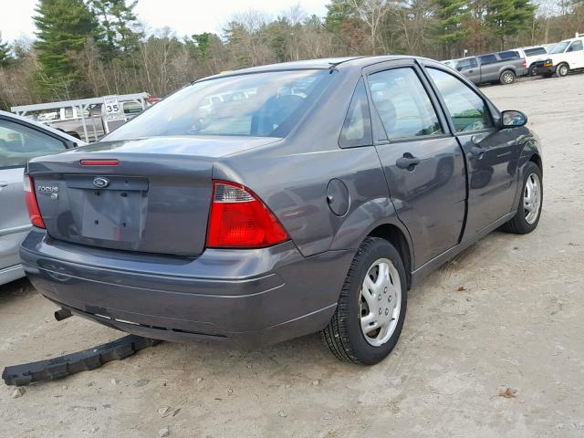 1FAHP34N27W327616 - 2007 FORD FOCUS ZX4 GRAY photo 4