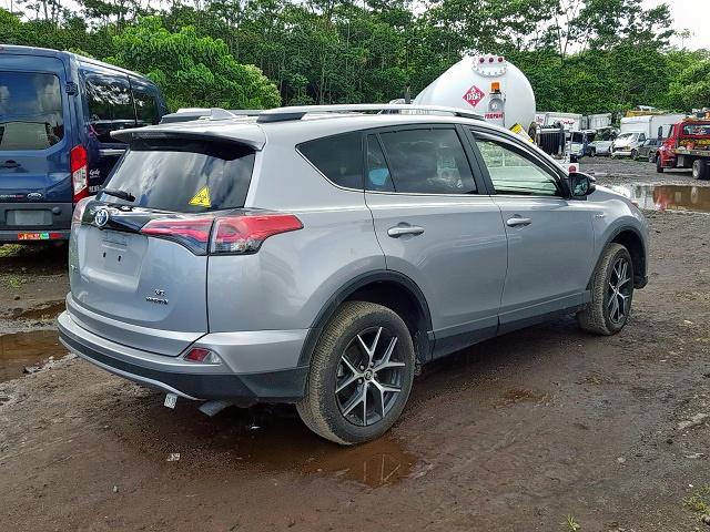 JTMJJREV0HD076459 - 2017 TOYOTA RAV4 HV SE SILVER photo 4