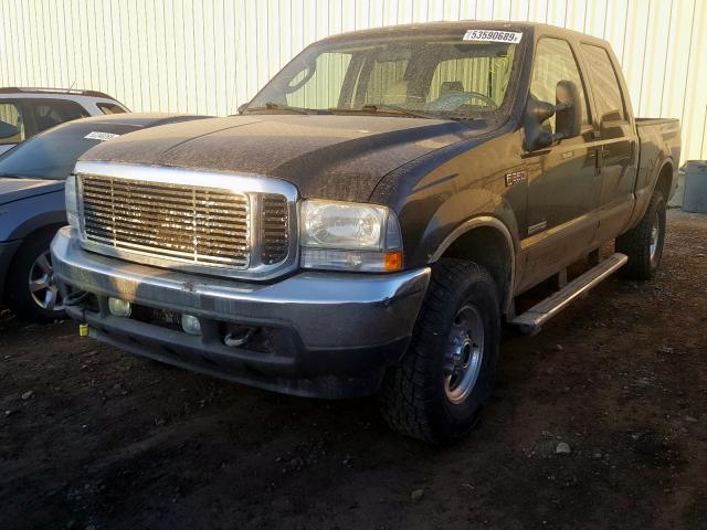 1FTSW31P44EB52876 - 2004 FORD F350 SRW S BLACK photo 2