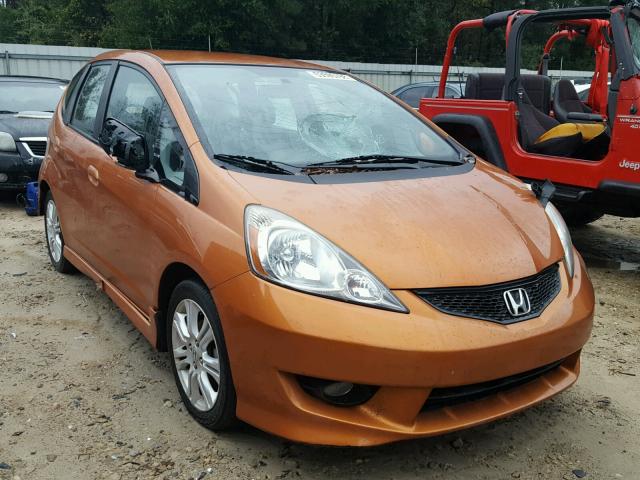 JHMGE8H5XBC004166 - 2011 HONDA FIT SPORT ORANGE photo 1