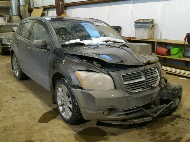 1B3CB5HA4AD633100 - 2010 DODGE CALIBER HE BLACK photo 1