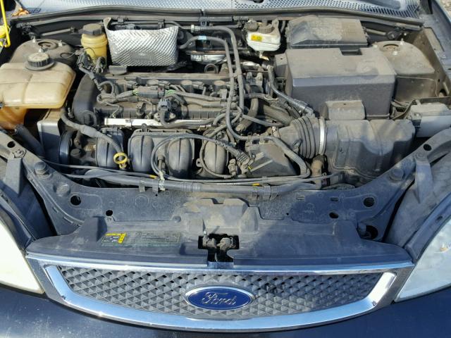 1FAFP34N55W300513 - 2005 FORD FOCUS ZX4 BLACK photo 7