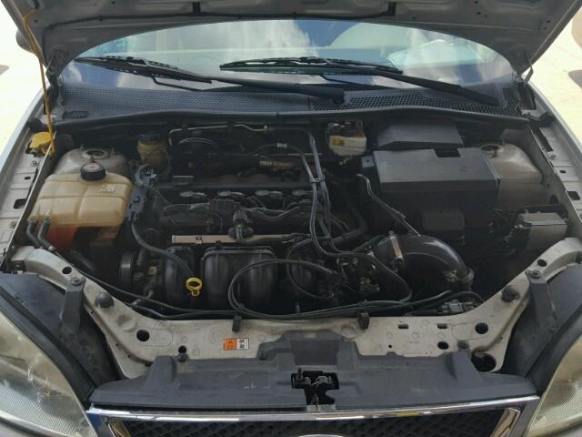 1FAFP34N05W174660 - 2005 FORD FOCUS ZX4 GRAY photo 7