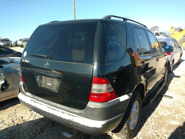 4JGAB54E5XA118885 - 1999 MERCEDES-BENZ ML 320 BLACK photo 4