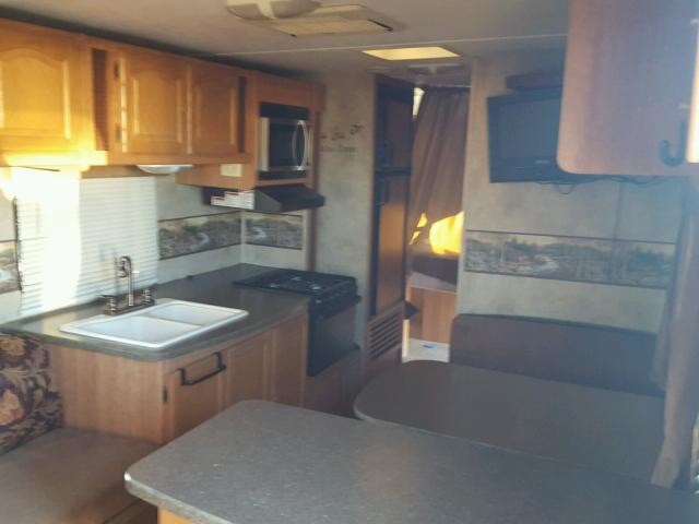 4YDT28522AT412370 - 2011 KEYSTONE PASSPORT WHITE photo 5