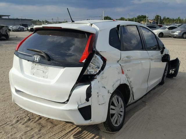 3HGGK5G5XFM748186 - 2015 HONDA FIT LX WHITE photo 4